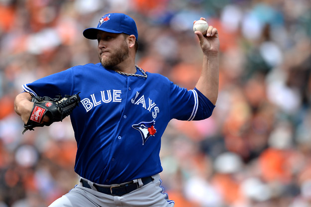 BALTIMORE, MD - APRIL 13: Starting pitcher Mark Buehrle #56 of the Toronto Blue Jays works the first inning against the Baltimore Orioles at Oriole Park at Camden Yards on April 13, 2014 in Baltimore, Maryland. 