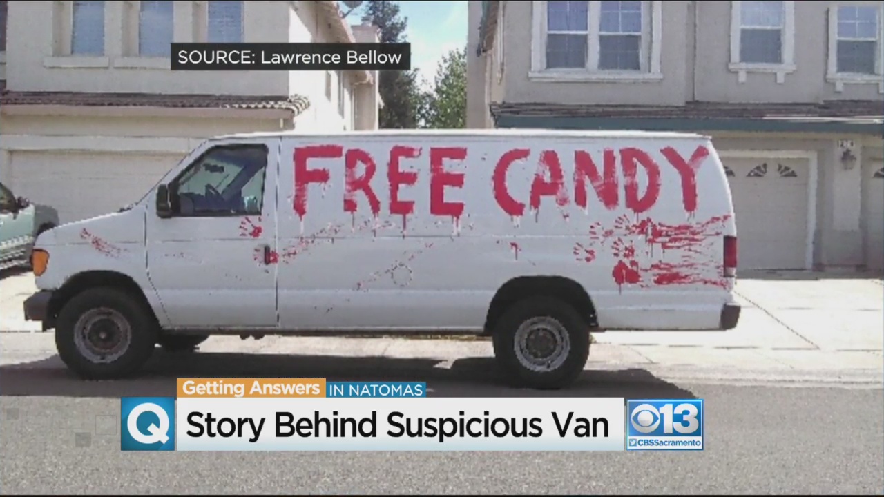 White Van With 'Free Candy' Painted In 