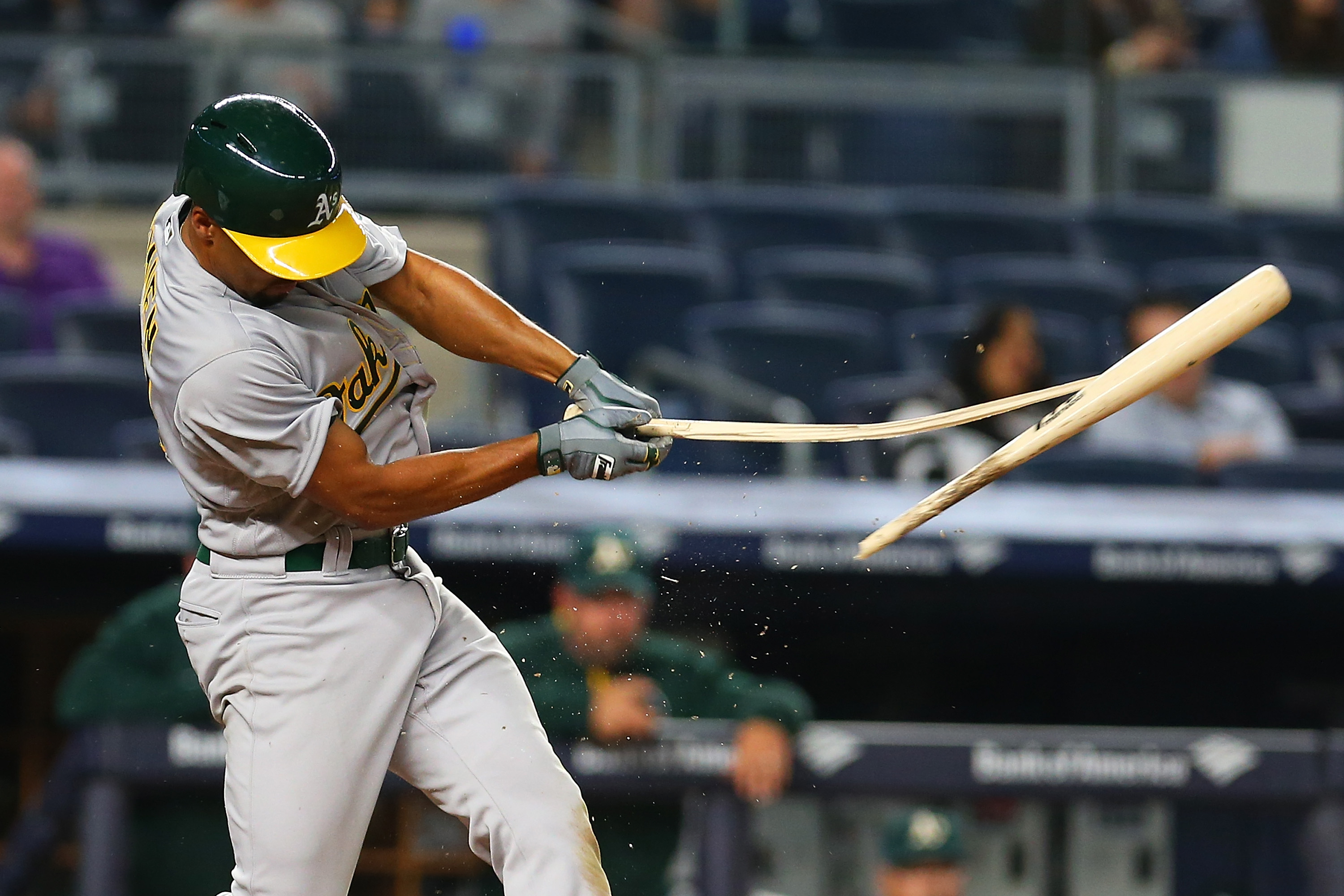 NEW YORK, NY - APRIL 21: Marcus Semien #10 of the Oakland Athletics breaks his bat during his at bat in the ninth inning against the New York Yankees at Yankee Stadium on April 21, 2016 in the Bronx borough of New York City.  