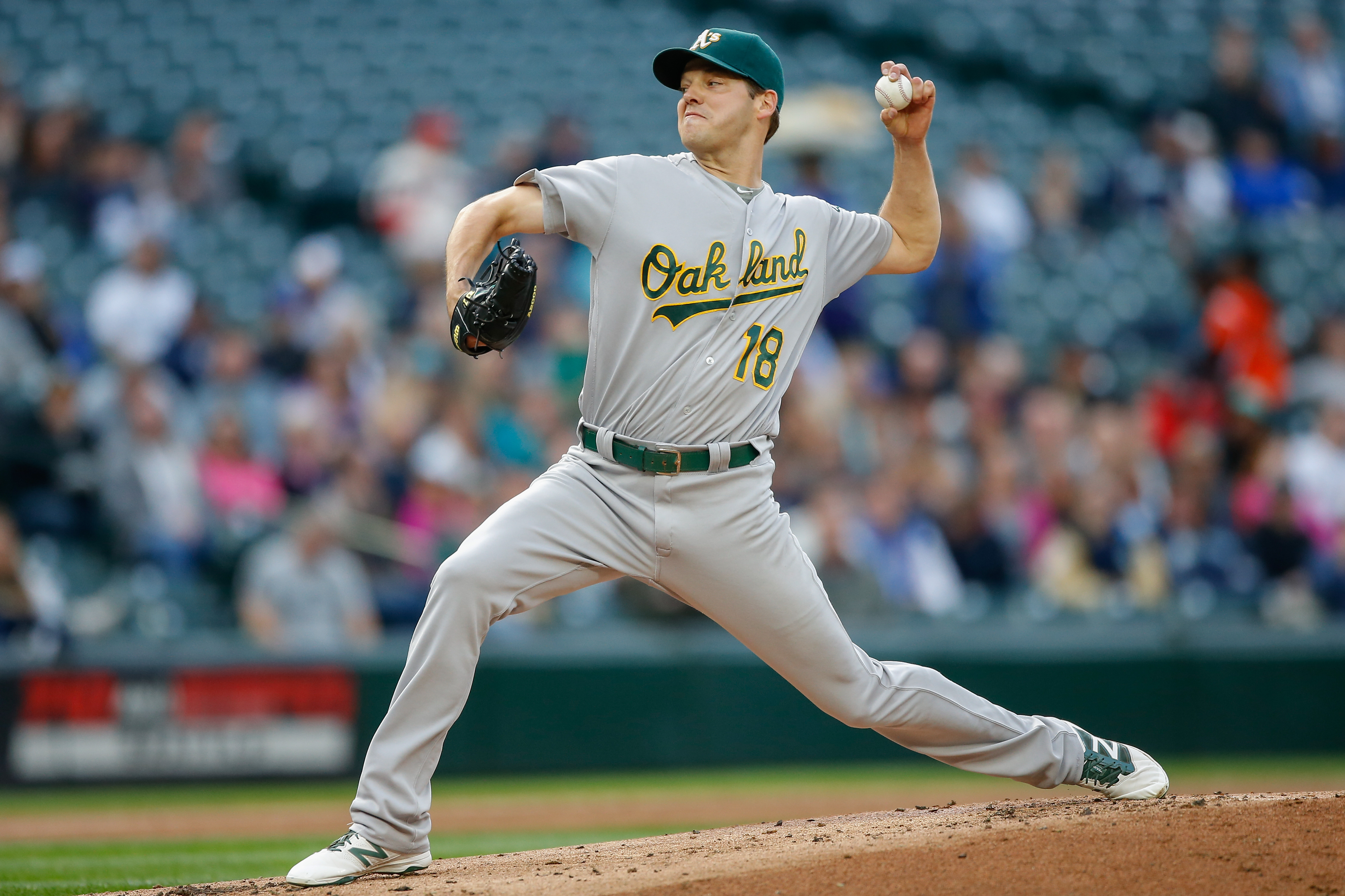 SEATTLE, WA - MAY 23:  Starting pitcher Rich Hill #18 of the Oakland Athletics pitches against the Seattle Mariners in the first inning at Safeco Field on May 23, 2016 in Seattle, Washington.  (Photo by Otto Greule Jr/Getty Images)