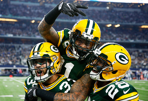 ARLINGTON, TX - JANUARY 15:  Micah Hyde #33, Ha Ha Clinton-Dix #21, and Josh Hawkins #28 of the Green Bay Packers celebrate in the second half during the NFC Divisional Playoff Game against the Dallas Cowboys at AT&T Stadium on January 15, 2017 in Arlington, Texas. (Photo by Joe Robbins/Getty Images)