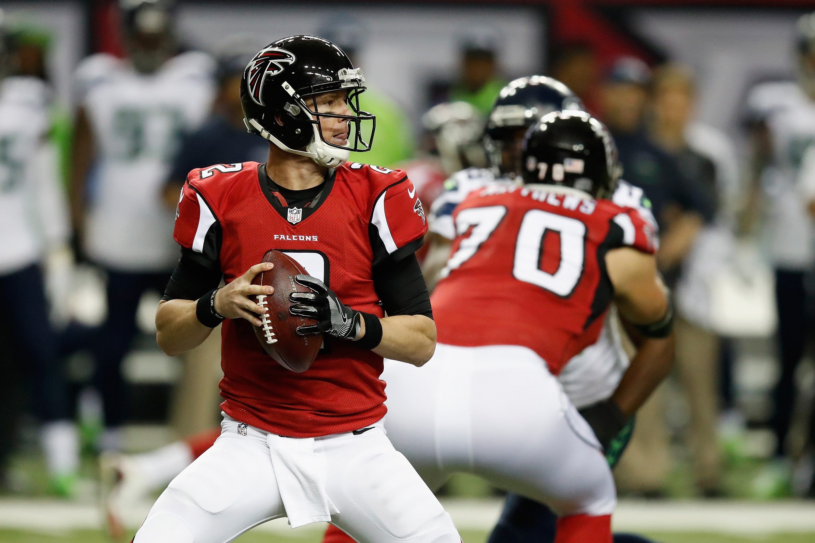 ATLANTA, GA - JANUARY 14:  Matt Ryan #2 of the Atlanta Falcons drops back to pass against the Seattle Seahawks during the game at the Georgia Dome on January 14, 2017 in Atlanta, Georgia.  (Photo by Gregory Shamus/Getty Images)