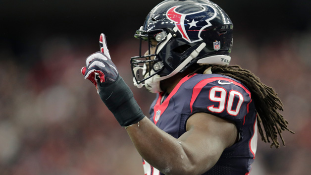 Jadeveon Clowney #90 of the Houston Texans celebrates after knocking down a pass from Connor Cook #8 of the Oakland Raiders during the first quarter of their AFC Wild Card game at NRG Stadium on January 7, 2017 in Houston, Texas.