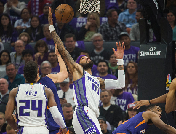 The Sacramento Kings' Willie Cauley-Stein (00) picks up a rebound against the Phoenix Suns at Golden 1 Center in Sacramento, Calif., on Tuesday, April 11, 2017. (