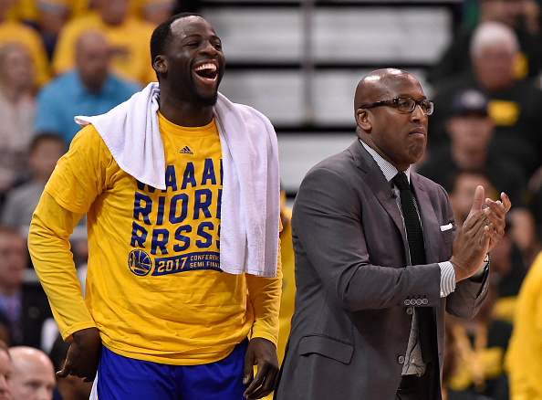 SALT LAKE CITY, UT - MAY 6: Draymond Green #23 and acting head coach Mike Brown of the Golden State Warriors react to a first half play during their game Utah Jazz in Game Three of the Western Conference Semifinals during the 2017 NBA Playoffs at Vivint Smart Home Arena on May 6, 2017 in Salt Lake City, Utah. NOTE TO USER: User expressly acknowledges and agrees that, by downloading and or using this photograph, User is consenting to the terms and conditions of the Getty Images License Agreement. 