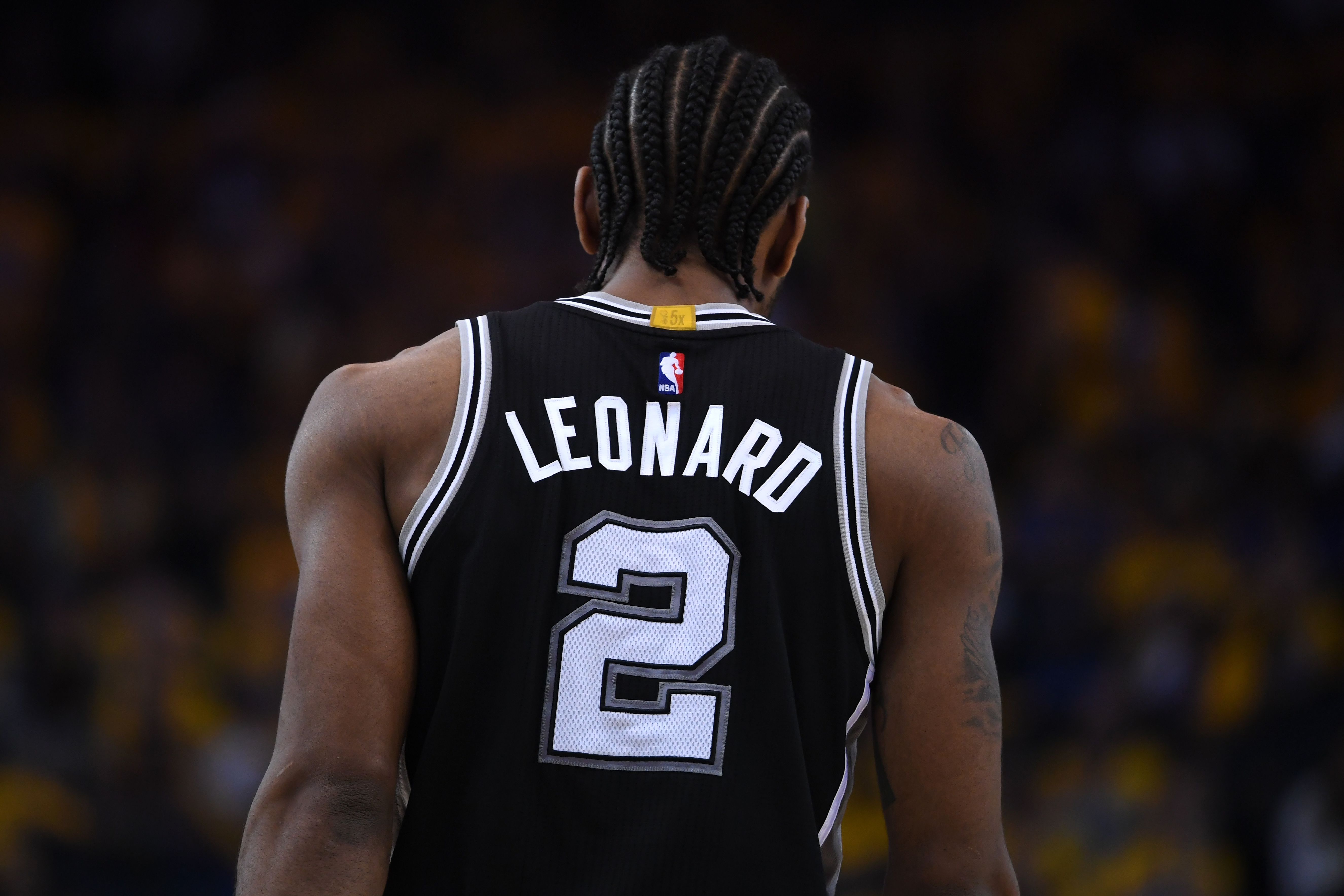 OAKLAND, CA - MAY 14: Kawhi Leonard #2 of the San Antonio Spurs stands on the court during Game One of the NBA Western Conference Finals against the Golden State Warriors at ORACLE Arena on May 14, 2017 in Oakland, California. NOTE TO USER: User expressly acknowledges and agrees that, by downloading and or using this photograph, User is consenting to the terms and conditions of the Getty Images License Agreement.