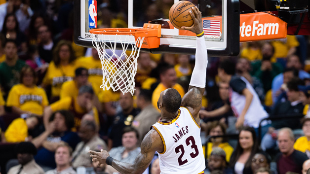 LeBron James #23 of the Cleveland Cavaliers dunks during the second half of Game One of the NBA Eastern Conference semifinals against the Toronto Raptors at Quicken Loans Arena on May 1, 2017 in Cleveland, Ohio. The Cavaliers defeated the Raptors 116-105.