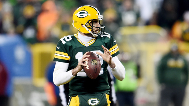 Aaron Rodgers #12 of the Green Bay Packers drops back to pass in the second quarter during the NFC Wild Card game against the New York Giants at Lambeau Field on January 8, 2017 in Green Bay, Wisconsin.