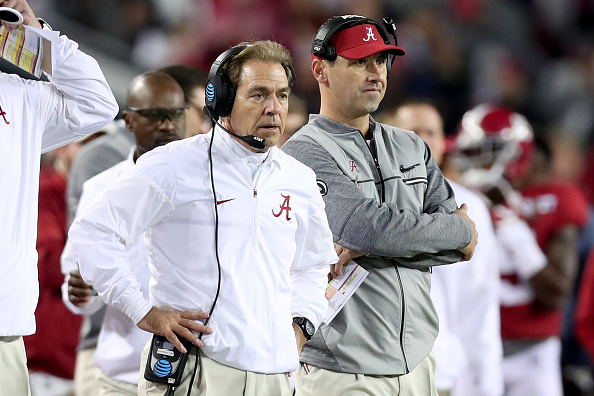 TAMPA, FL - JANUARY 09:  Head coach Nick Saban (L) and offensive coordinator Steve Sarkisian of the Alabama Crimson Tide stand on the sideline during the second half of the 2017 College Football Playoff National Championship Game against the Clemson Tigers at Raymond James Stadium on January 9, 2017 in Tampa, Florida.  