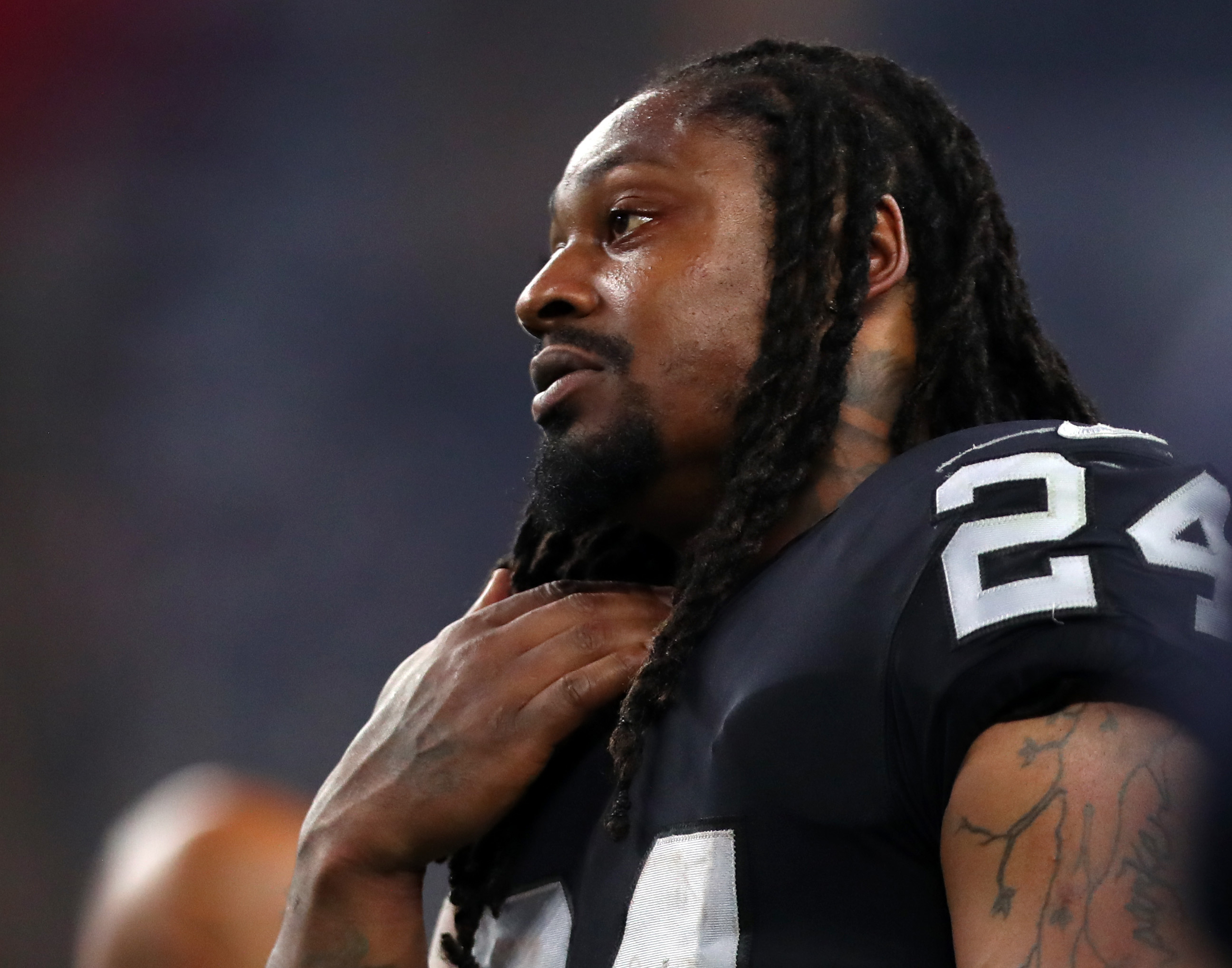 ARLINGTON, TX - AUGUST 26: Marshawn Lynch #24 of the Oakland Raiders on the sidelines in a preseason game against the Dallas Cowboys at AT&T Stadium on August 26, 2017 in Arlington, Texas. (Photo by Tom Pennington/Getty Images)