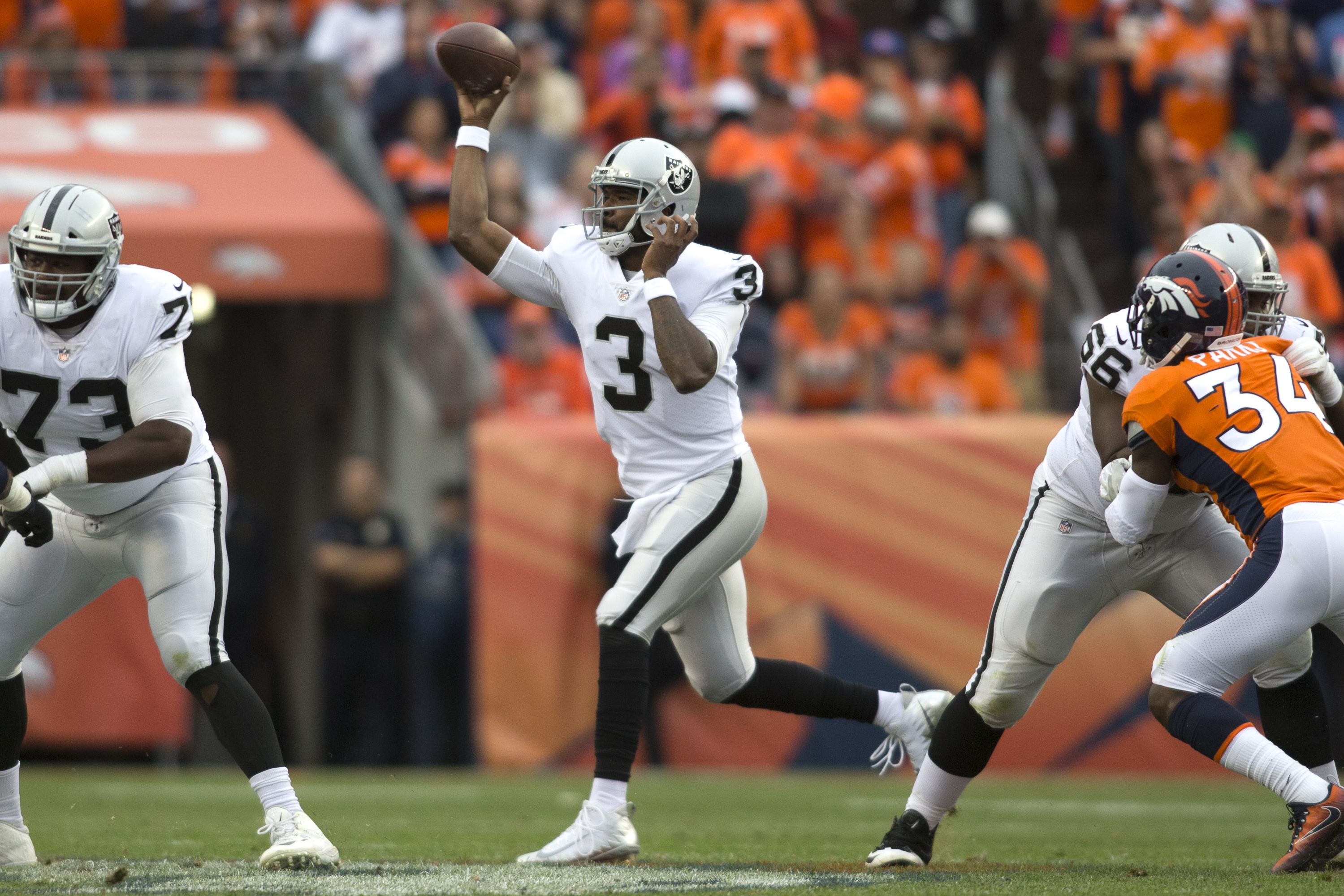 DENVER, CO - OCTOBER 01: Oakland Raiders quarterback EJ Manuel (3) throws the ball during the Oakland Raiders vs. Denver Broncos football game on October 1, 2017 at Sports Authority Field in Denver, CO. 