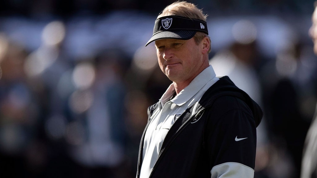 Head coach Jon Gruden of the Oakland Raiders watches his team warm up before the game against the Jacksonville Jaguars at RingCentral Coliseum on December 15, 2019 in Oakland, California.